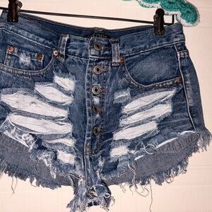 Love Culture Distressed Button-Fly Denim Cutoff Shorts in Dark Blue